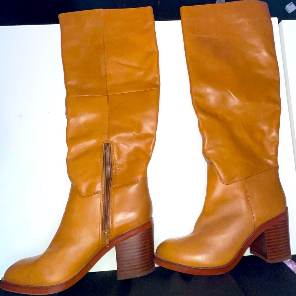 Women’s Camel colored Knee boots size 9 from Aldo. Slightly worn